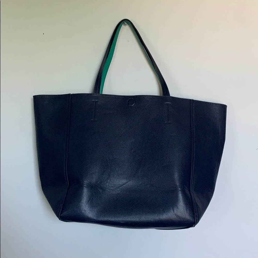 Reversible faux leather tote